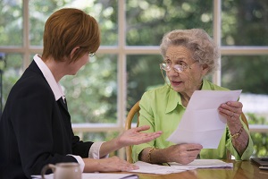 Senior woman meeting with an estate planning lawyer